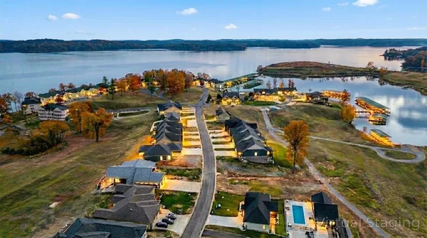 a bathroom with a sink mirror and toilet