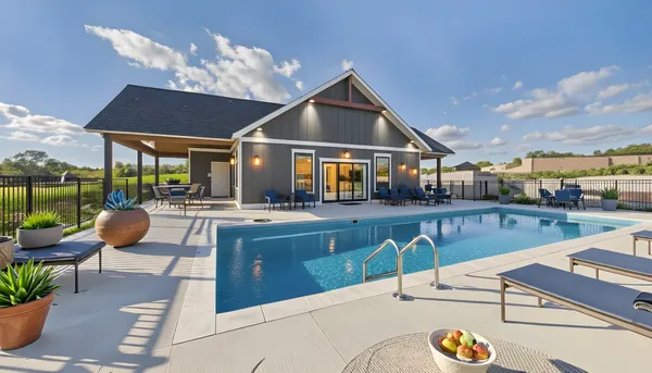 a view of a house with a porch and a yard