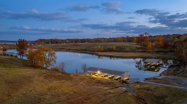 an aerial view of a house with a garden