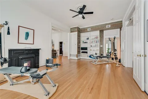 a view of a livingroom with furniture and a fireplace