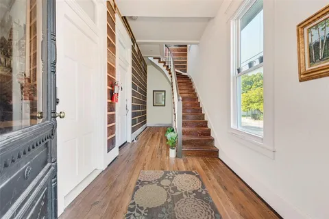 a view of an entryway with staircase