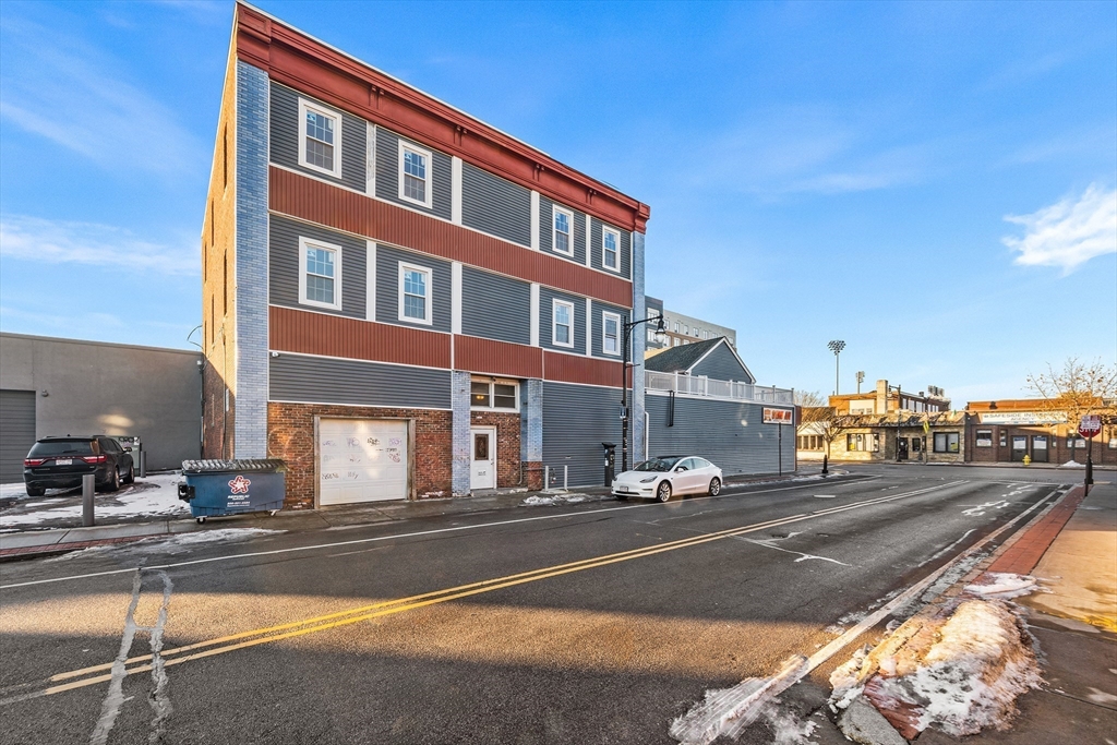64 Green Street Worcester, MA 01604 - Photo 6 of 9 a front view of a building with street