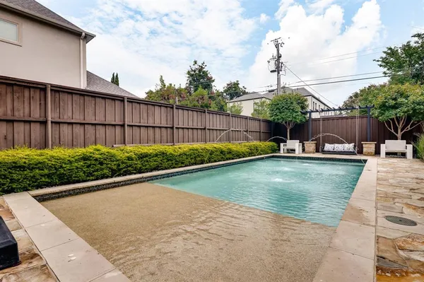 a view of a backyard with a small yard