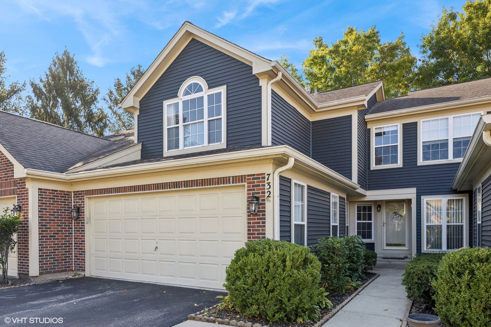 732 Bent Ridge Lane Elgin, IL 60120 - Photo 1 of 25 a view of a house with a yard and potted plants