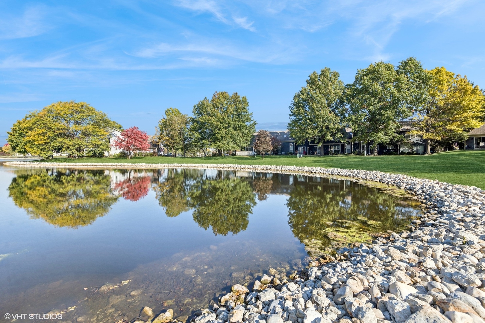 732 Bent Ridge Lane Elgin, IL 60120 - Photo 25 of 25 a view of a lake with a yard