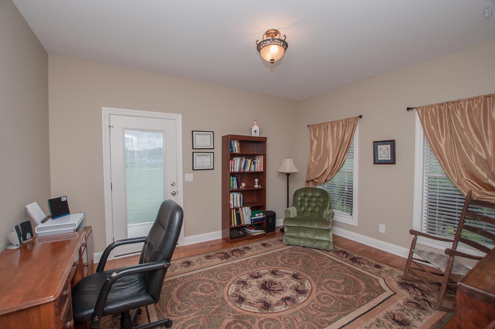 2172 Holloway Road Lebanon, TN 37090 - Photo 11 of 21 a workspace with furniture and a wooden floor