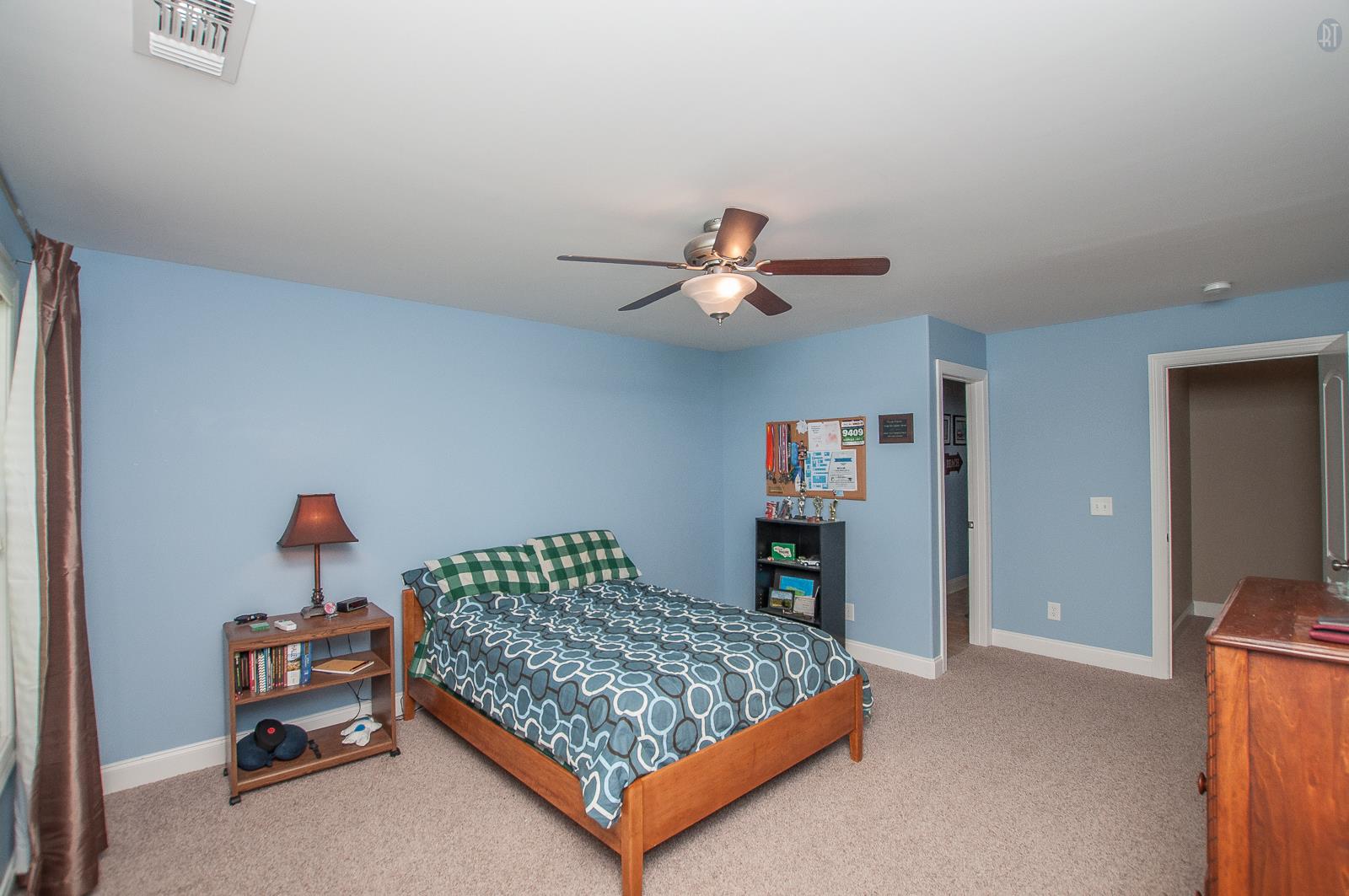 2172 Holloway Road Lebanon, TN 37090 - Photo 12 of 21 a bedroom with a bed and ceiling fan