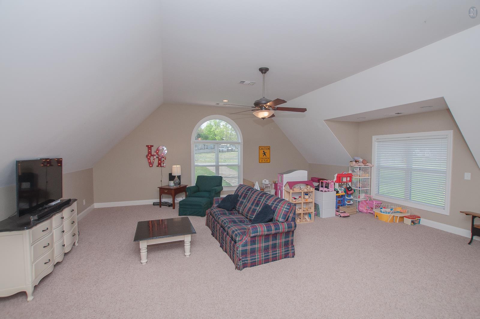 2172 Holloway Road Lebanon, TN 37090 - Photo 15 of 21 a living room with furniture and a flat screen tv
