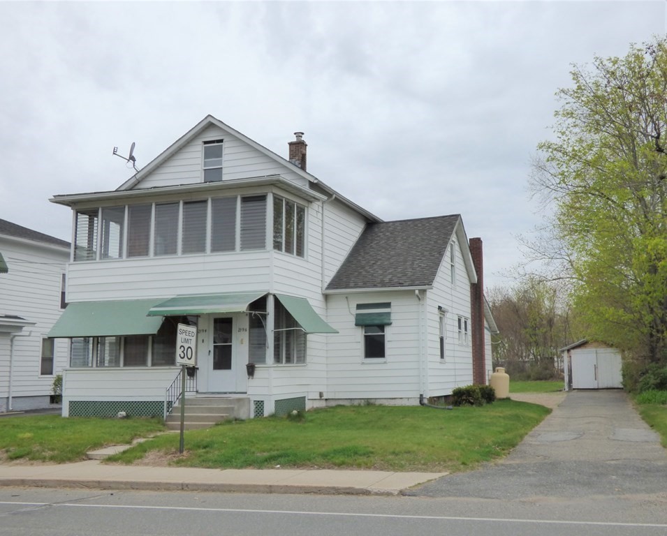 2194-2196 Main Street Three Rivers, MA 01080 - Photo 1 of 28 a front view of a house with a yard