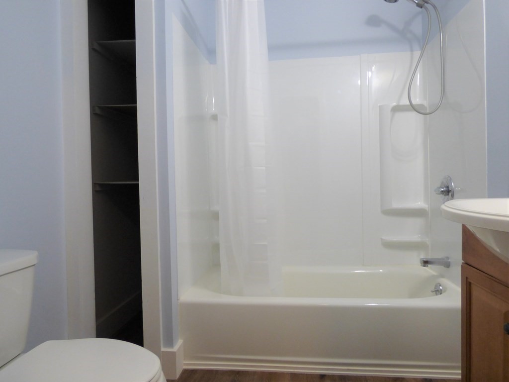 2194-2196 Main Street Three Rivers, MA 01080 - Photo 12 of 28 a bathroom with a toilet and a bathtub