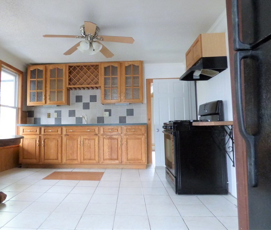 2194-2196 Main Street Three Rivers, MA 01080 - Photo 19 of 28 a kitchen with stainless steel appliances granite countertop a refrigerator and a sink