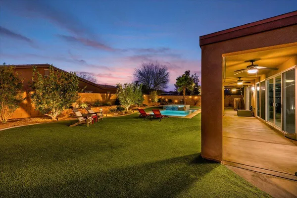 a view of a house with a yard