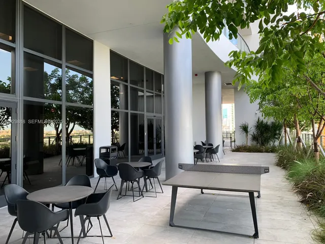 a view of a swimming pool with a lounge chairs