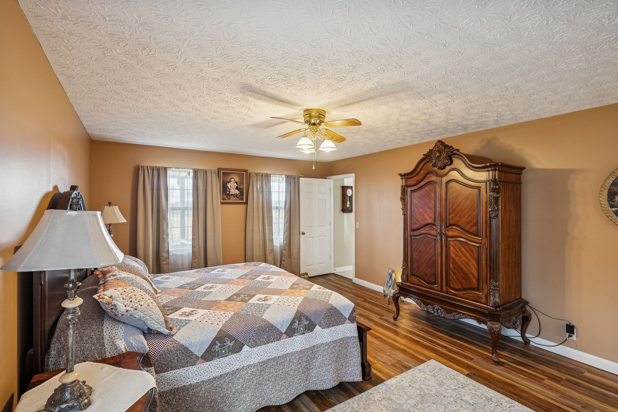 524 Willie Jarvis Road Sparta, TN 38583 - Photo 22 of 59 a bedroom with a bed and wooden floor