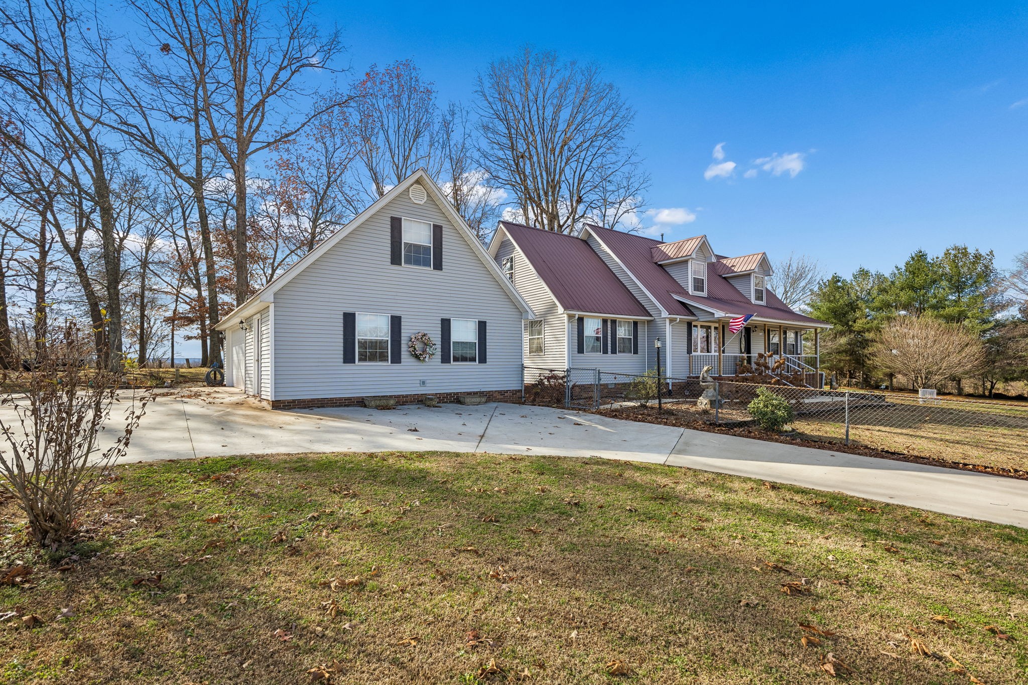 524 Willie Jarvis Road Sparta, TN 38583 - Photo 3 of 59 a front view of house with yard and trees in the background