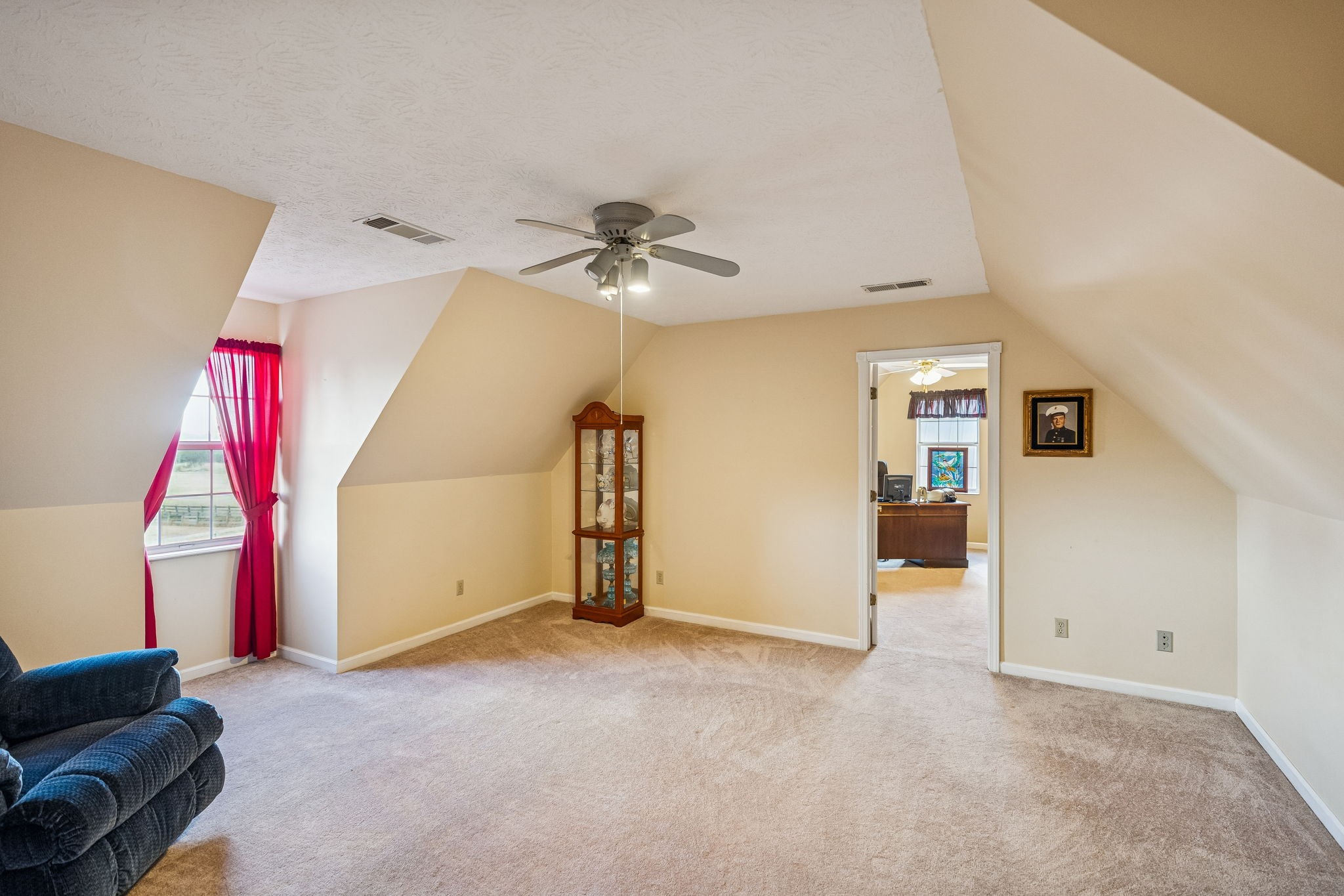 524 Willie Jarvis Road Sparta, TN 38583 - Photo 31 of 59 a view of a livingroom with a furniture and a ceiling fan