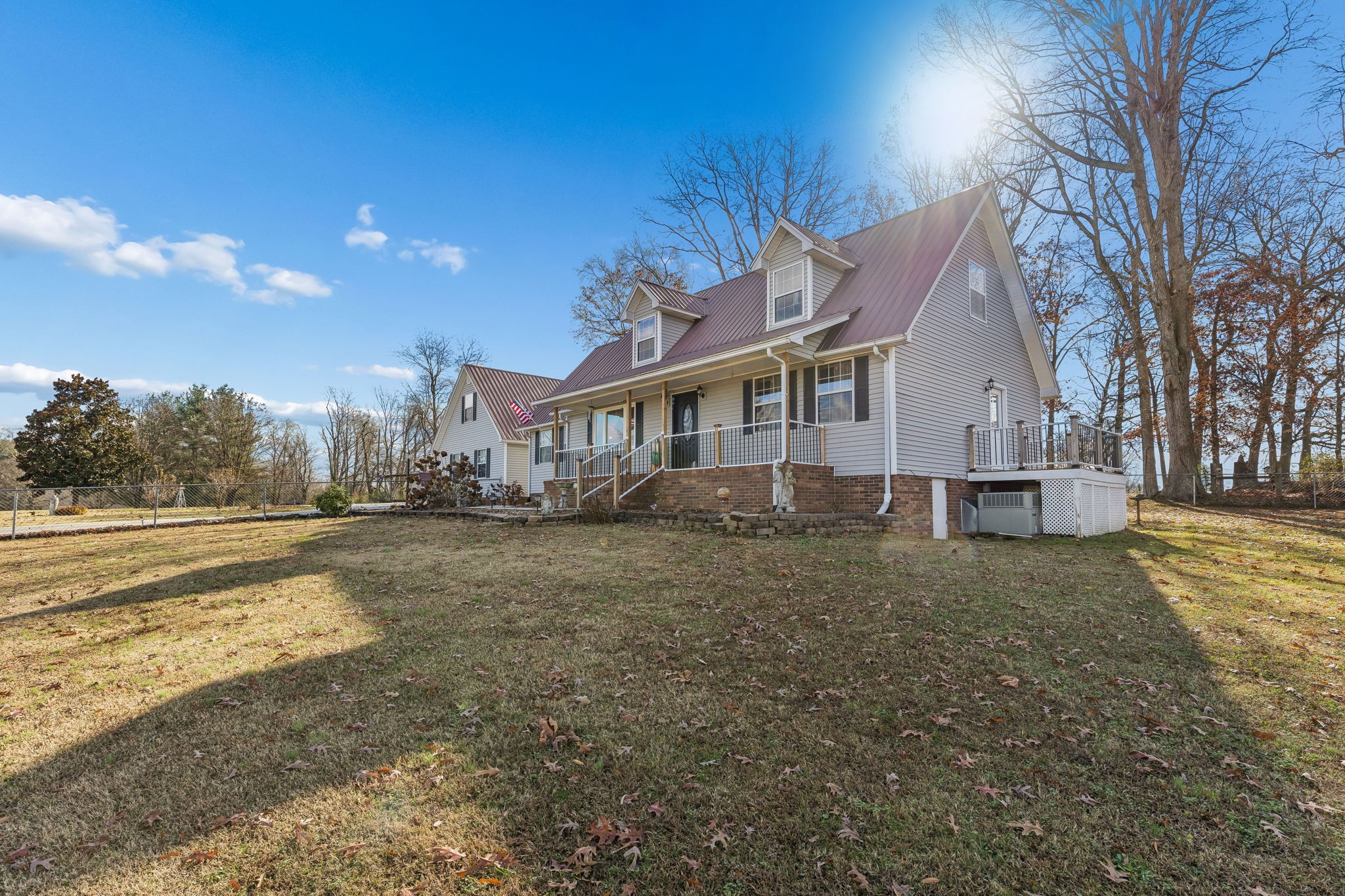 524 Willie Jarvis Road Sparta, TN 38583 - Photo 54 of 59 a view of a large house with a yard and large trees