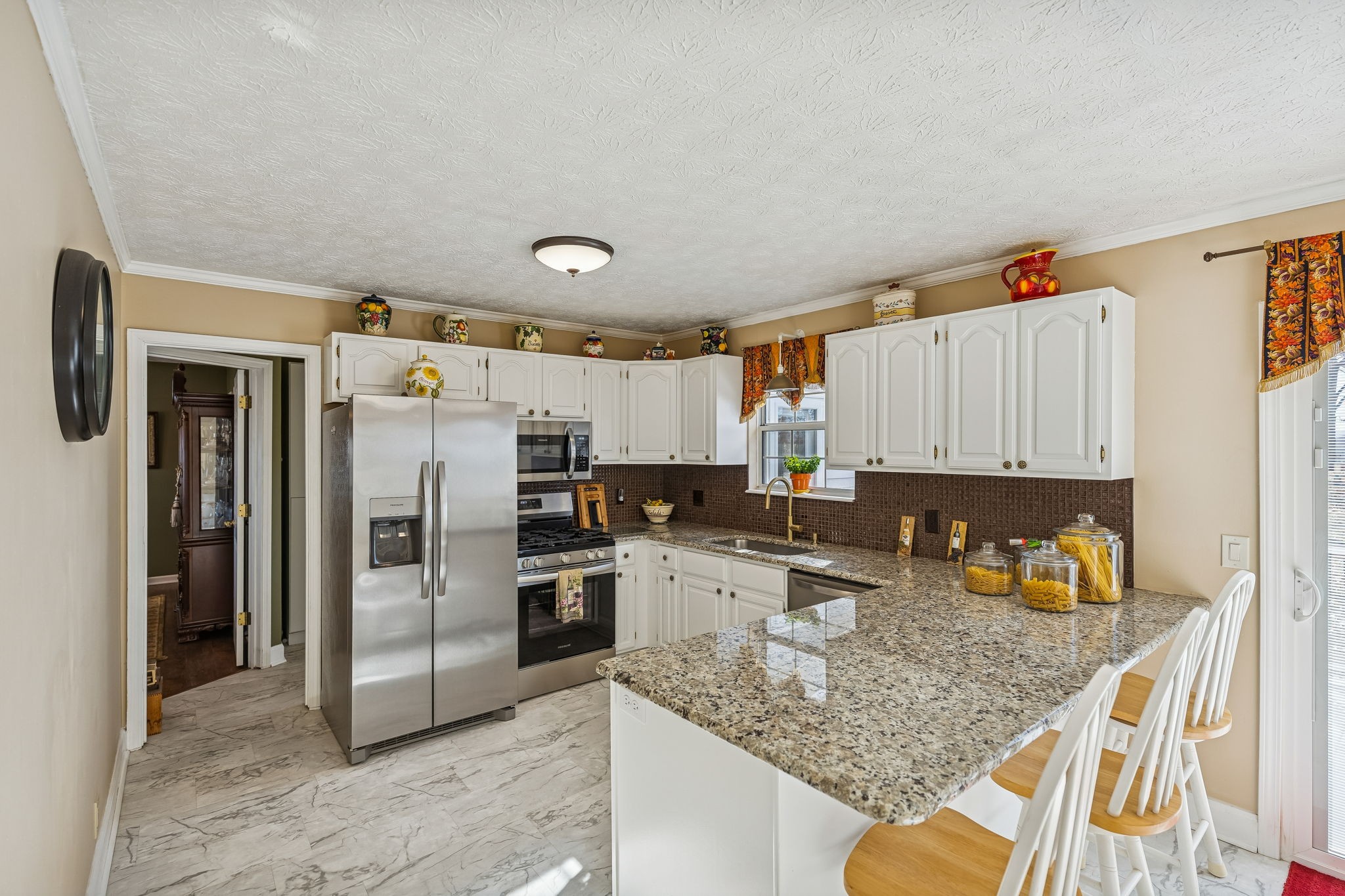 524 Willie Jarvis Road Sparta, TN 38583 - Photo 9 of 59 a kitchen with a refrigerator a sink and dishwasher