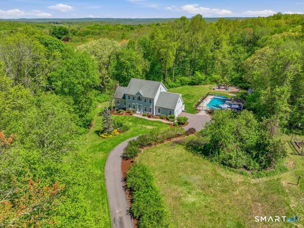 15 Fox Ridge Lane Hebron, CT 06248 - Photo 1 of 40 Gorgeous Colonial with inground pool, amazing yard on 2.5 Acres on a desirable cul-de-sac neighborhood!