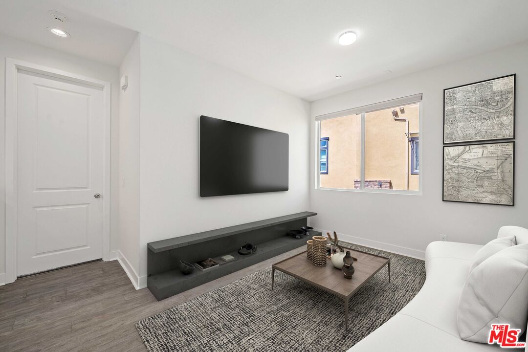 659 Daniel Freeman Circle Inglewood, CA 90301 - Photo 15 of 34 a living room with furniture and a flat screen tv