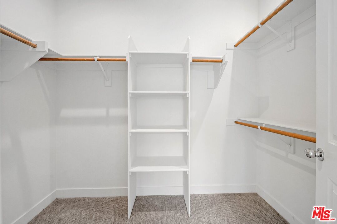 659 Daniel Freeman Circle Inglewood, CA 90301 - Photo 19 of 34 a view of walk in closet with empty racks