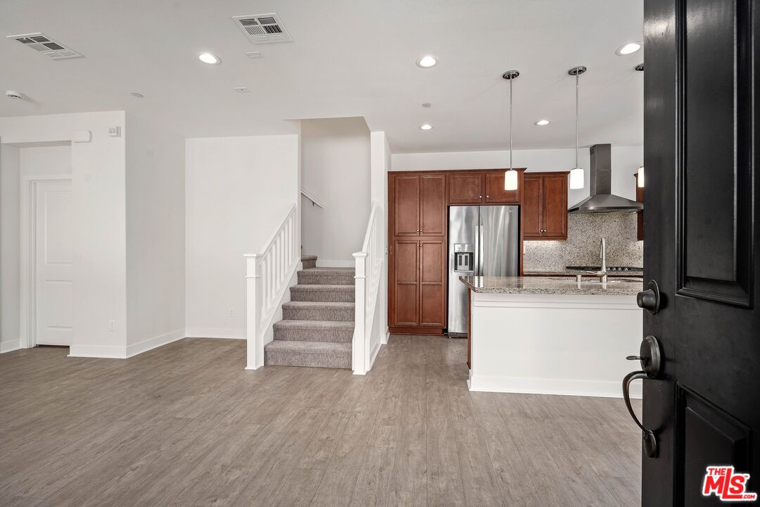 659 Daniel Freeman Circle Inglewood, CA 90301 - Photo 7 of 34 a view of kitchen with refrigerator and window