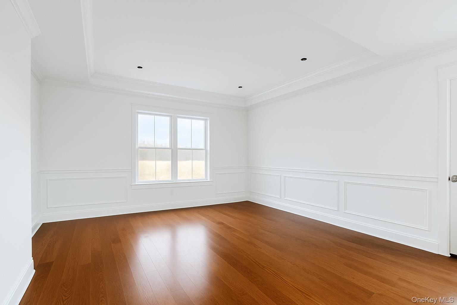 Lot #45 Frans Way Rocky Point, NY 11778 - Photo 5 of 11 an empty room with wooden floor and windows