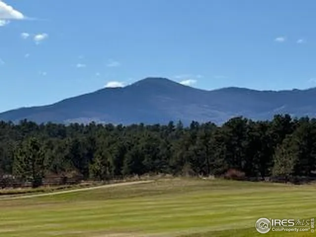 a view of a mountain with a outdoor space