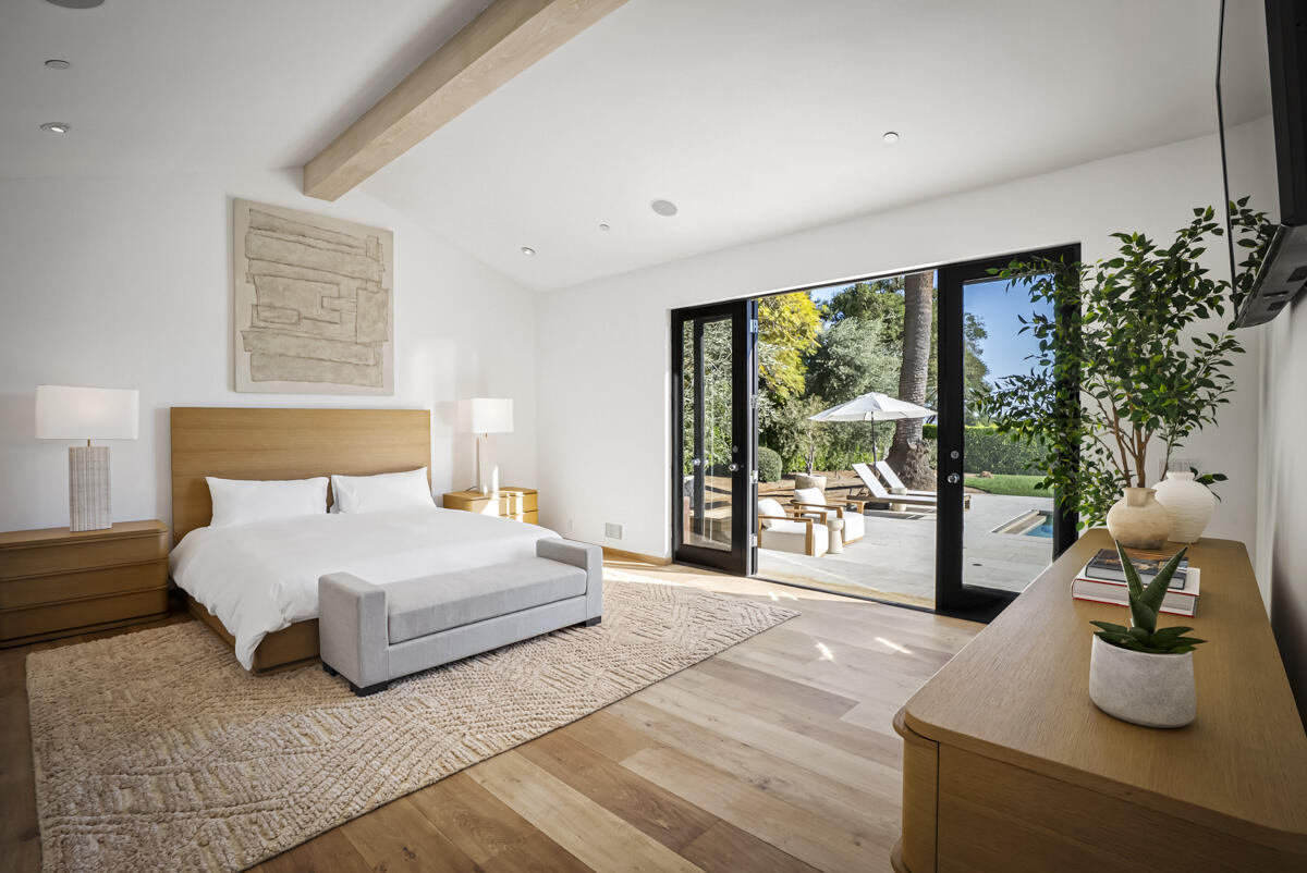 1190 Garden Lane Montecito, CA 93108 - Photo 15 of 43 a bedroom with a large bed and a large window