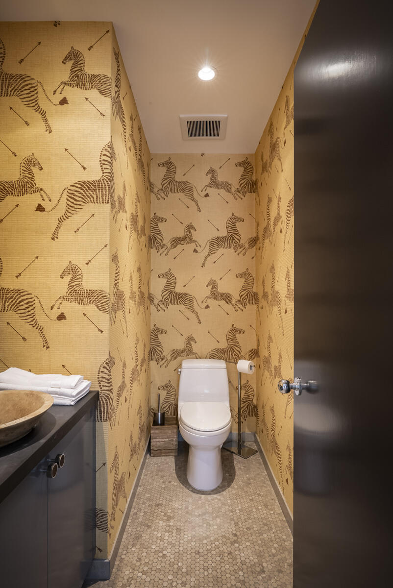 1190 Garden Lane Montecito, CA 93108 - Photo 29 of 43 a bathroom with a toilet and a shower curtain
