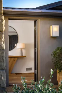 a bathroom with a toilet a sink and a shower