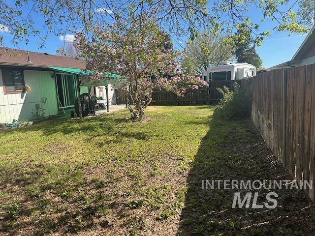 601 Riggs Avenue Emmett, ID 83617 - Photo 19 of 46 Fenced backyard featuring a patio area