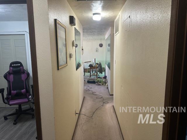 601 Riggs Avenue Emmett, ID 83617 - Photo 27 of 46 Hall with a textured wall