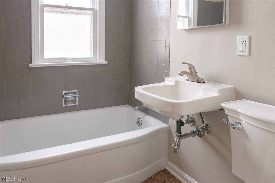 13909 Granger Road Cleveland, OH 44125 - Photo 11 of 35 New plumbing fixtures in bathroom on main level