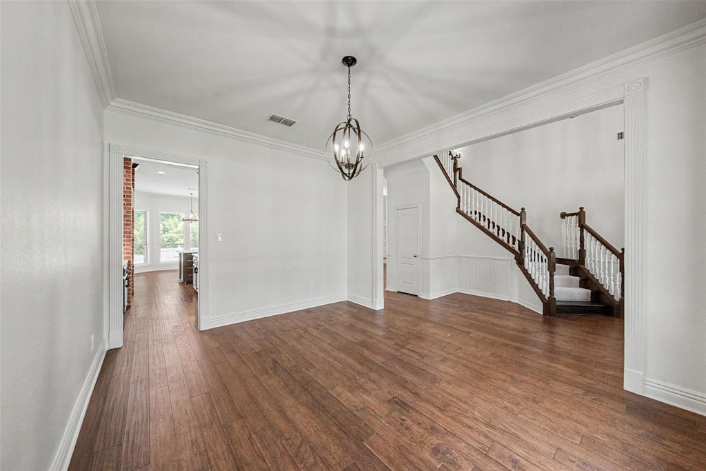 1200 Mount Gilead Road Keller, TX 76262 - Photo 9 of 38 a view of empty room with wooden floor and fan