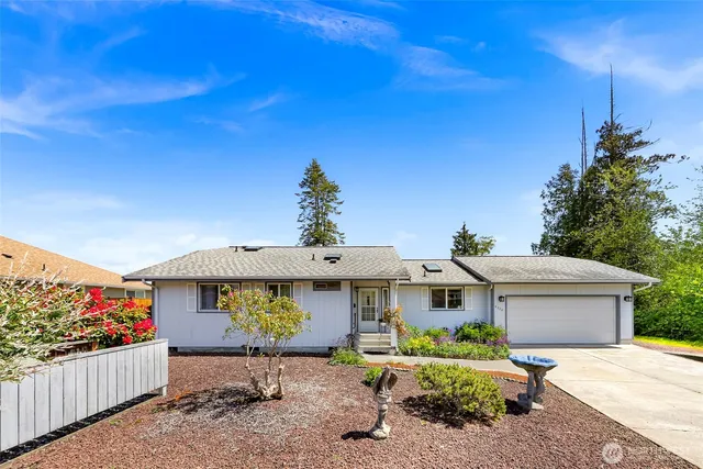 a view of house with chair and tables