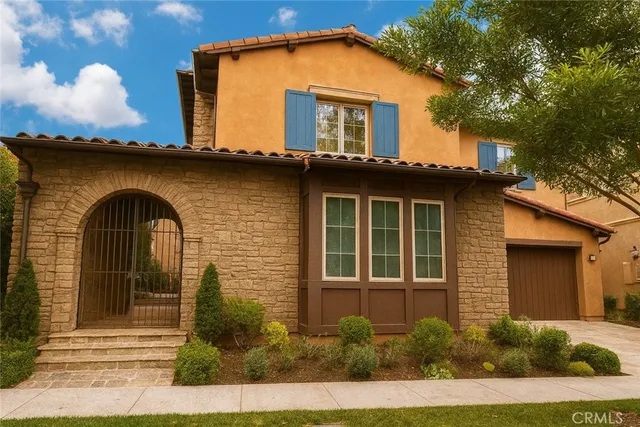 a front view of a house with garage