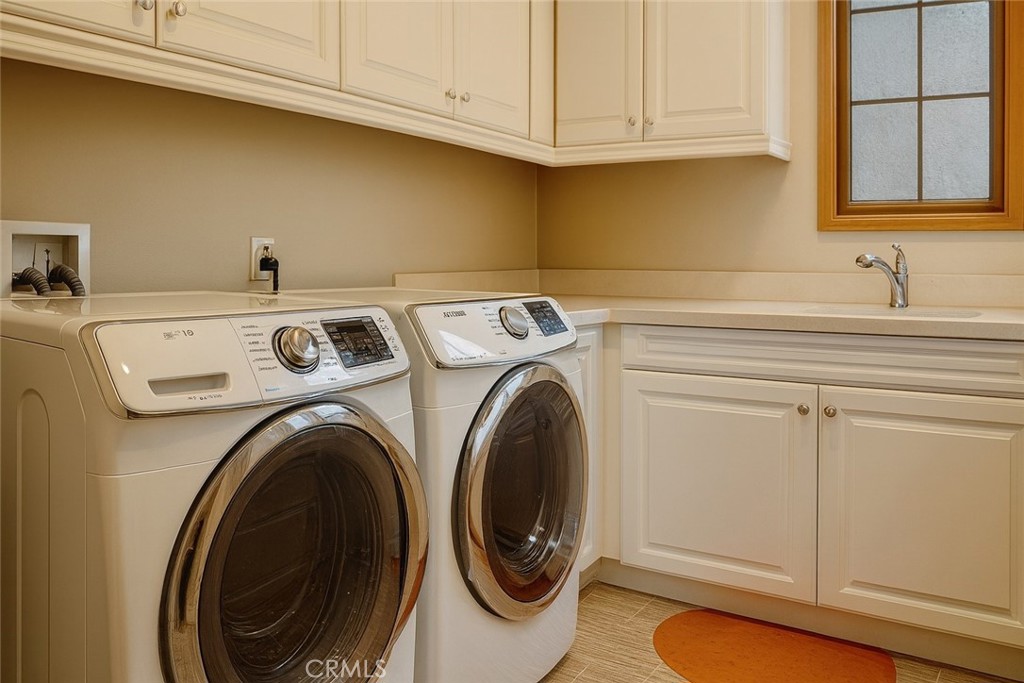 20 Tenderfoot Irvine, CA 92602 - Photo 20 of 26 a utility room with dryer and washer