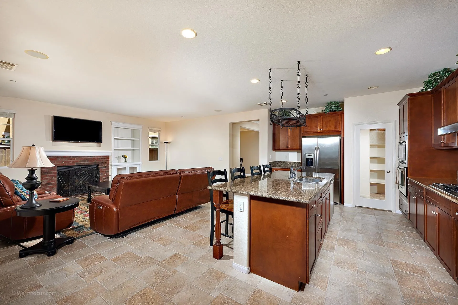 3025 Calico Street Santee, CA 92071 - Photo 12 of 59 a living room with furniture and a flat screen tv