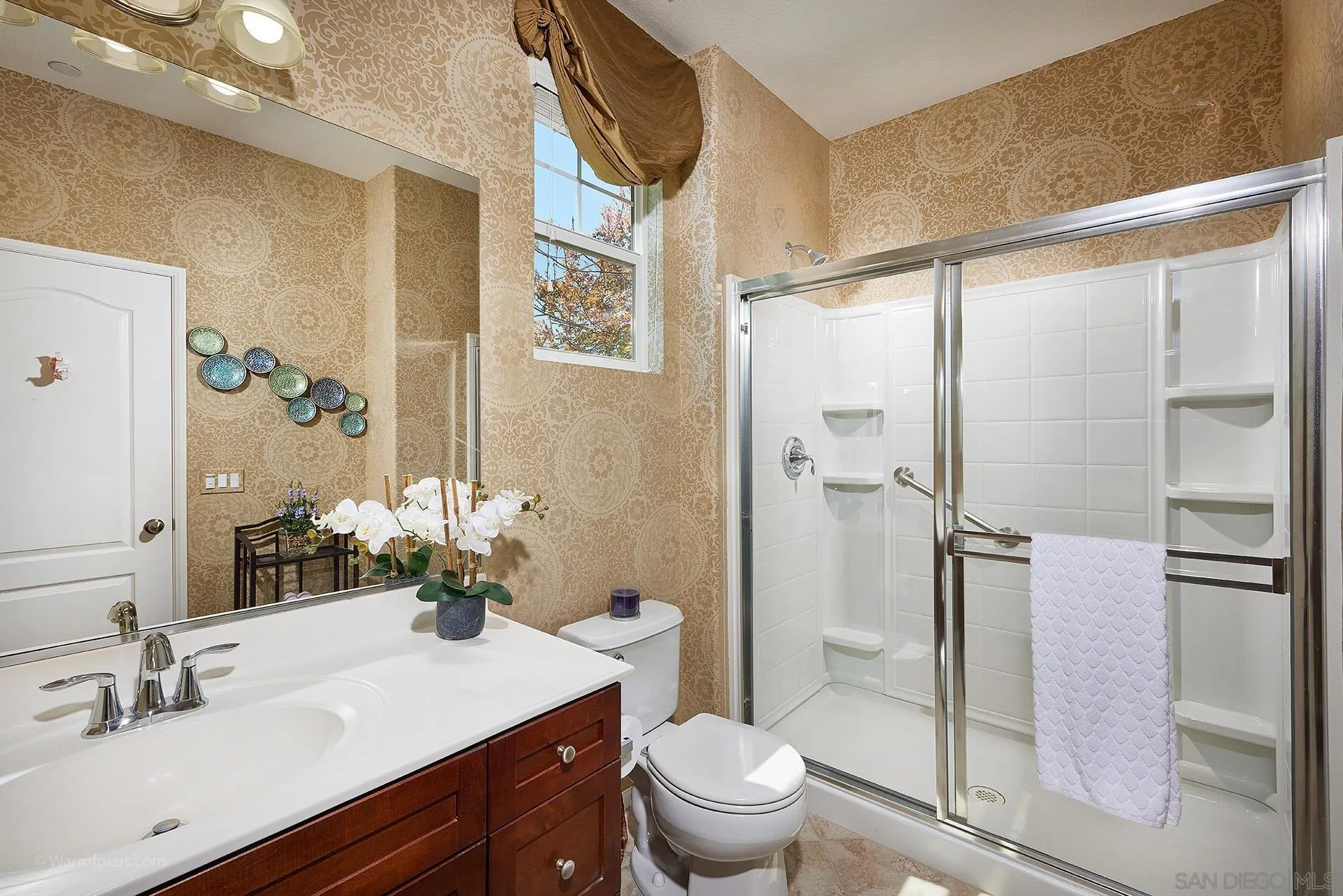 3025 Calico Street Santee, CA 92071 - Photo 18 of 59 a bathroom with a sink toilet and shower