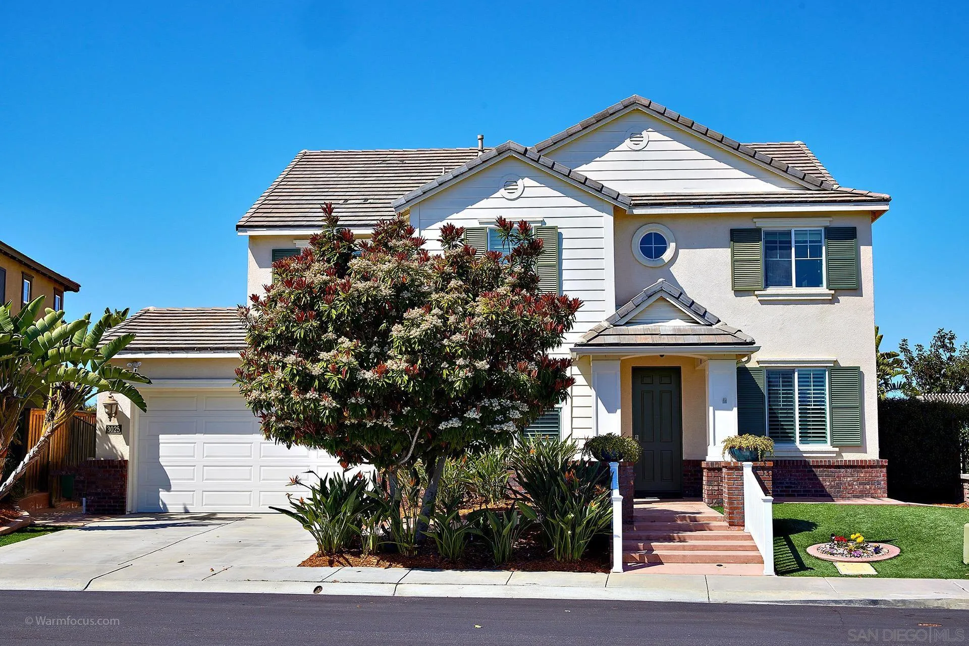 3025 Calico Street Santee, CA 92071 - Photo 2 of 59 a front view of a house with garden