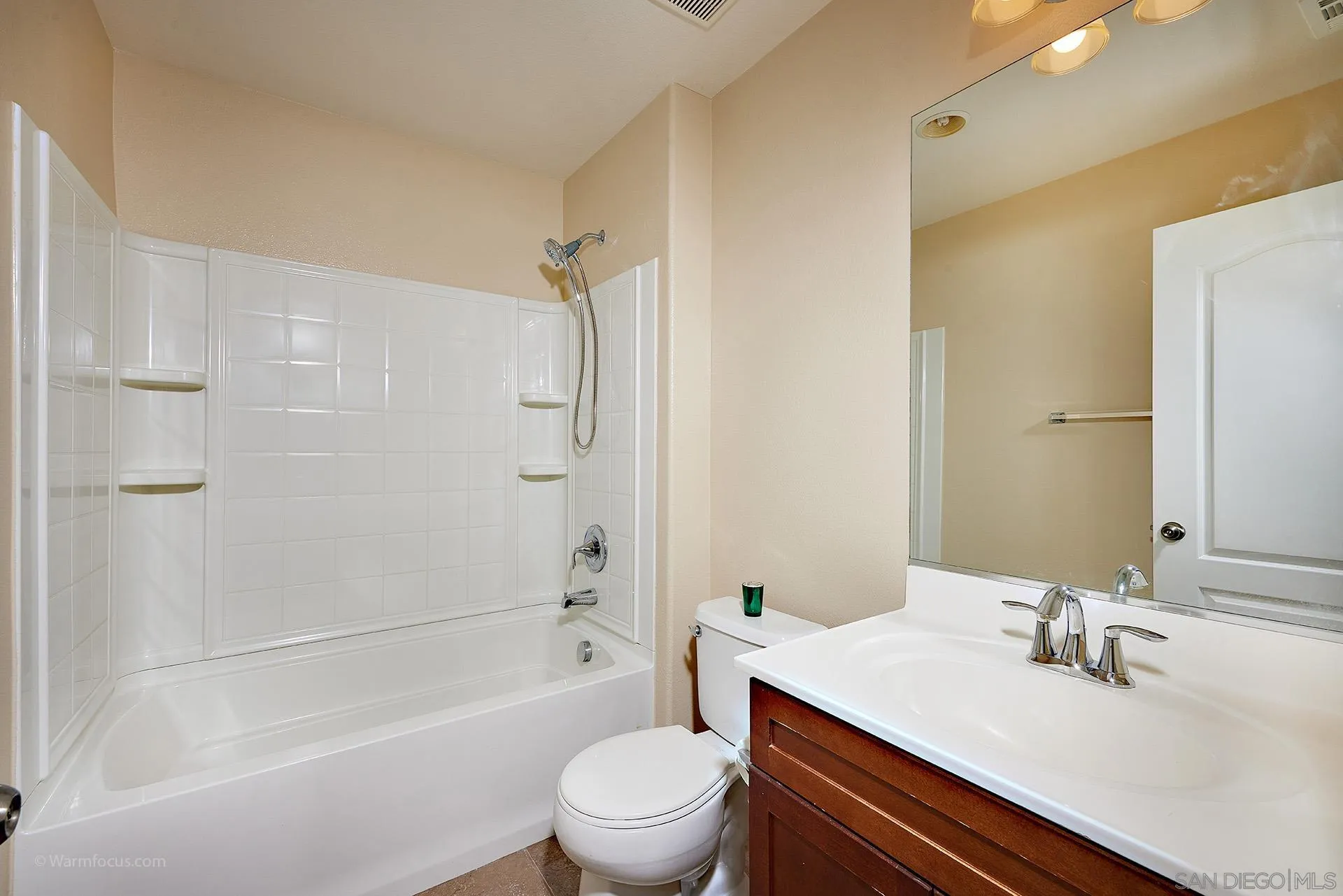 3025 Calico Street Santee, CA 92071 - Photo 21 of 59 a bathroom with a sink a toilet and shower