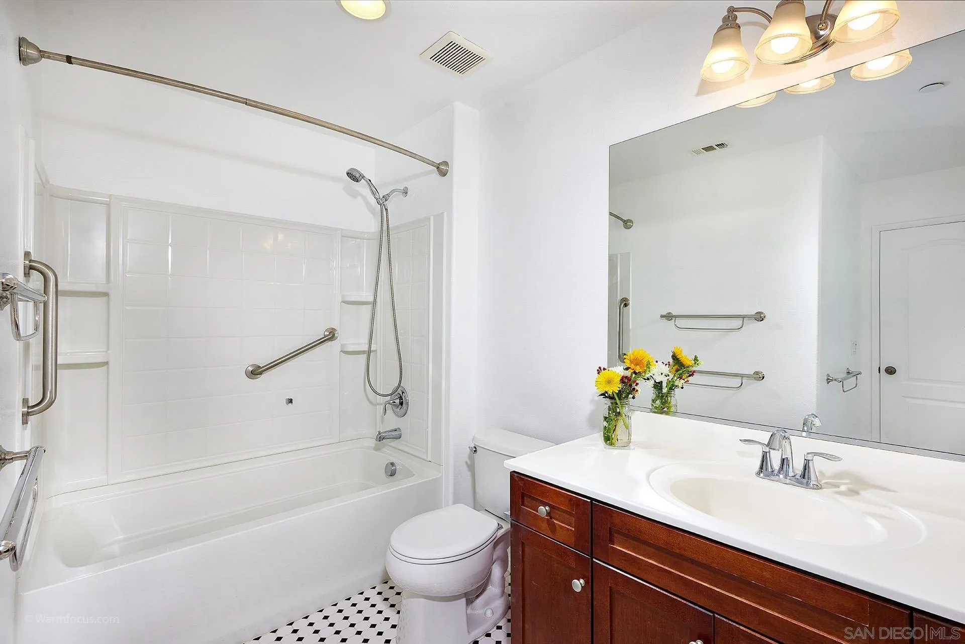 3025 Calico Street Santee, CA 92071 - Photo 25 of 59 a bathroom with a sink a toilet and shower