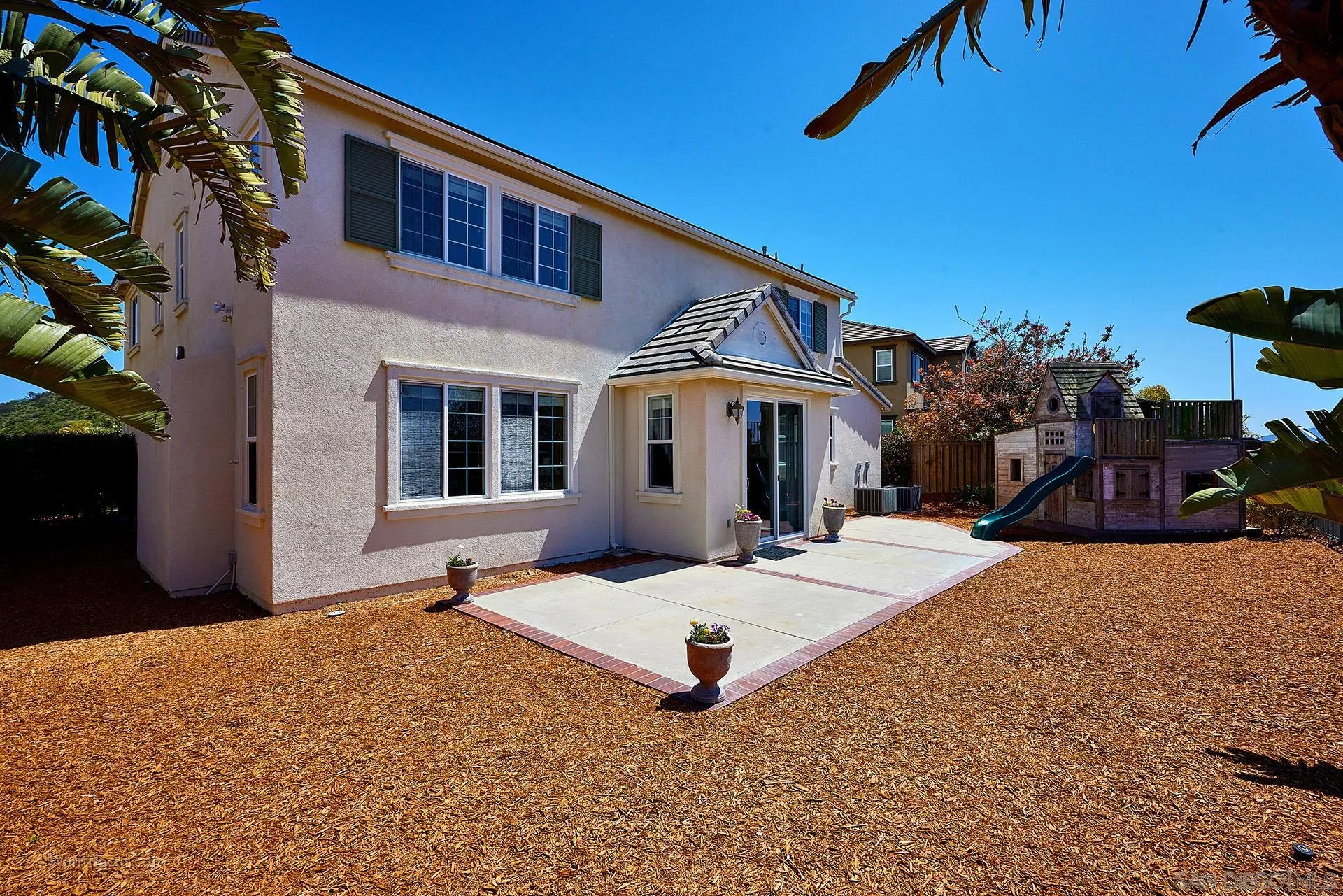 3025 Calico Street Santee, CA 92071 - Photo 35 of 59 a front view of a house with a yard