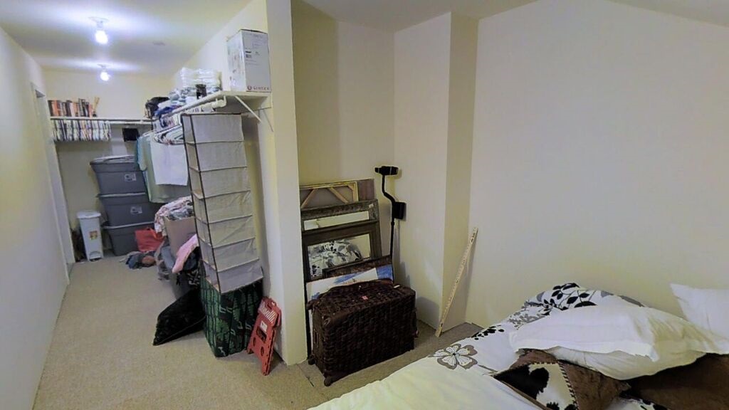 3710 Lower Honoapiilani Road, Unit F44 Lahaina, HI 96761 - Photo 11 of 17 a bedroom with a bed and cabinets