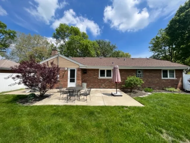 a view of a yard in front of house