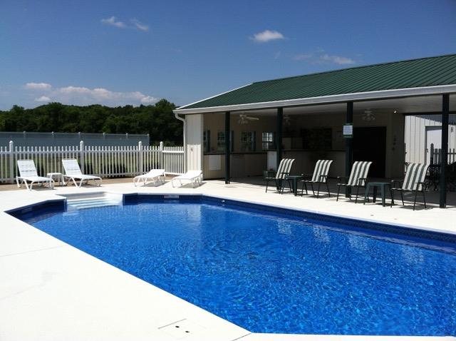 6317 Lampkins Bridge Road College Grove, TN 37046 - Photo 21 of 28 a swimming pool with outdoor seating and barbeque oven