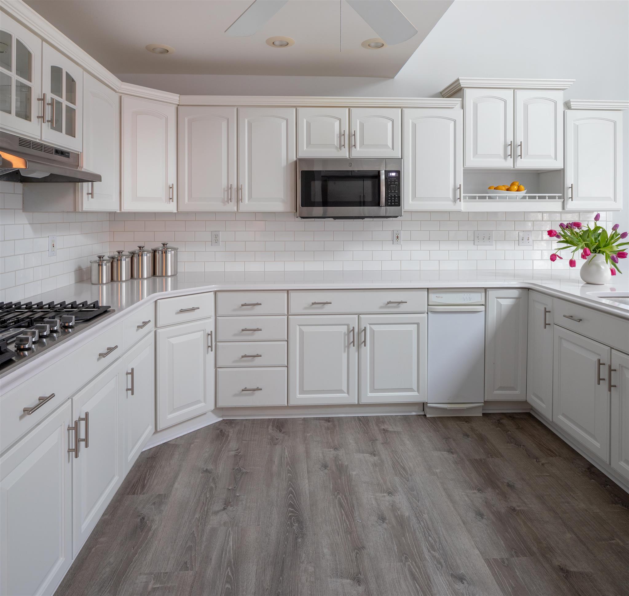 6317 Lampkins Bridge Road College Grove, TN 37046 - Photo 8 of 28 a kitchen with sink cabinets and stainless steel appliances