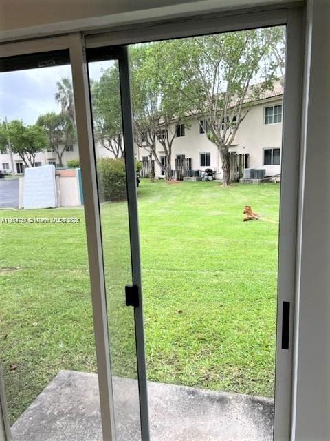 2920 Southeast 13th Road, Unit 10445 Homestead, FL 33035 - Photo 13 of 13 a view of a porch with a yard