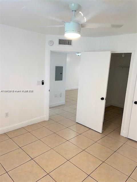 2920 Southeast 13th Road, Unit 10445 Homestead, FL 33035 - Photo 9 of 13 a view of a kitchen with cabinet and a refrigerator